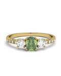 ANILLO OSIRIS DE ORO Y TOPACIOS BLANCOS CON 2 GARRAS DE 3MM Y CENTRO EN PERIDOTO DE 5X4MM - CRESBER