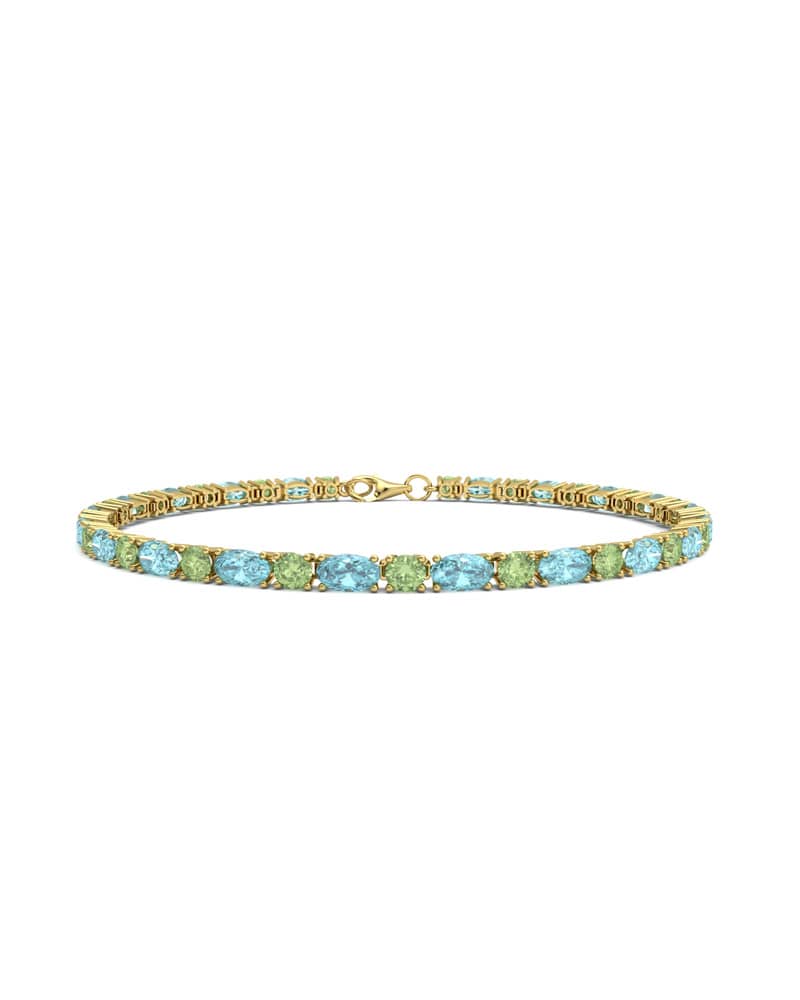 PULSERA FALLS ORO TOPACIO AZUL Y PERIDOTO - CRESBER