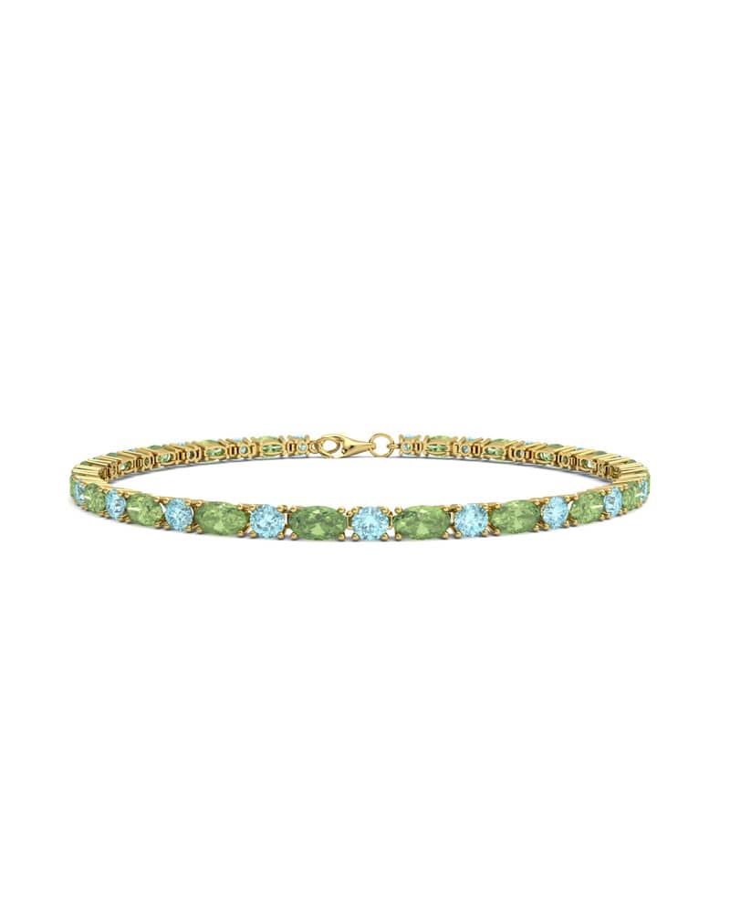 PULSERA FALLS ORO PERIDOTO Y TOPACIO AZUL - CRESBER