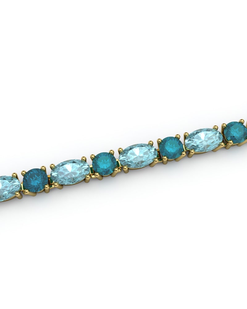 PULSERA FALLS ORO TOPACIO AZUL Y LONDON - CRESBER