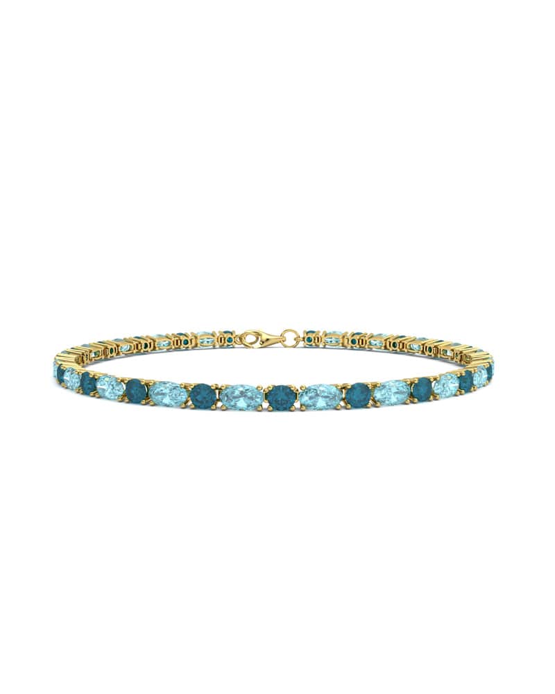 PULSERA FALLS ORO TOPACIO AZUL Y LONDON - CRESBER