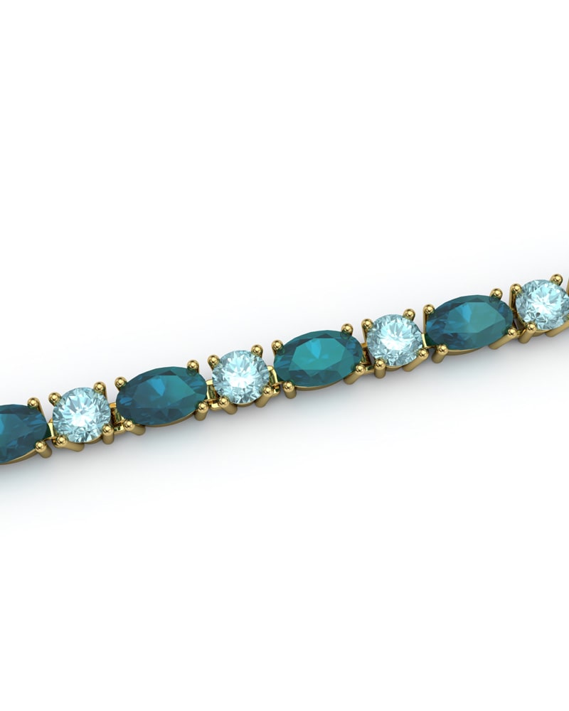 PULSERA FALLS ORO LONDON Y TOPACIO AZUL - CRESBER