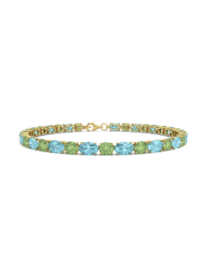 PULSERA FALLS ORO TOPACIO AZUL Y PERIDOTO - CRESBER