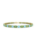 PULSERA FALLS ORO PERIDOTO Y TOPACIO AZUL - CRESBER