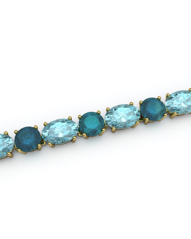 PULSERA FALLS ORO TOPACIO AZUL Y LONDON - CRESBER