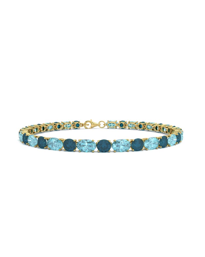 PULSERA FALLS ORO TOPACIO AZUL Y LONDON - CRESBER