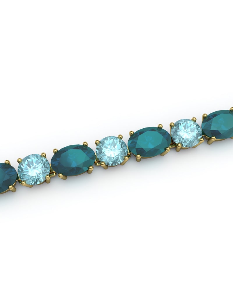 PULSERA FALLS ORO LONDON Y TOPACIO AZUL - CRESBER