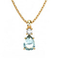 COLGANTE GAIA DE ORO GAIA CON DIAMANTE DE 0,01 CT Y TOPACIO CON PERA  8X6MM - CRESBER