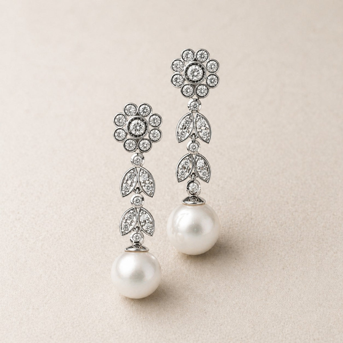 Pendientes de novia xon diamantes perlas y oro blanco de cresber