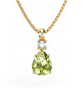 COLGANTE GAIA DE ORO GAIA CON DIAMANTE DE 0,01 CT Y TOPACIO CON PERA OLIVINA 9X7MM - CRESBER